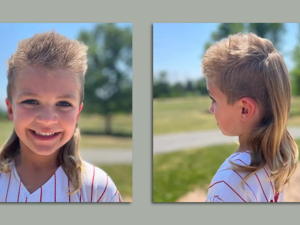 A little boy with a mullet haircut