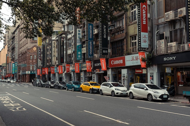 Multiple cars on the side of the road